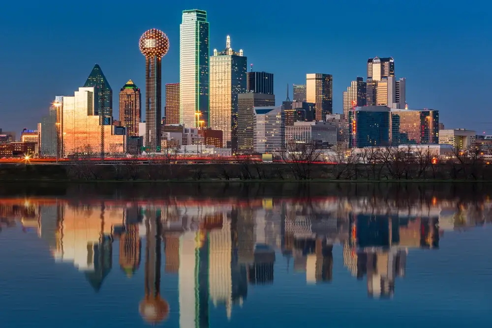 Dallas - Skyline reflected in Trinity River at sunset