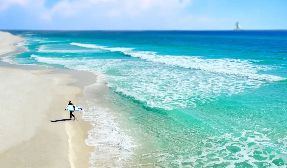 Florida Panhandle, USA, Surfer on Beach, New Orleans to Miami