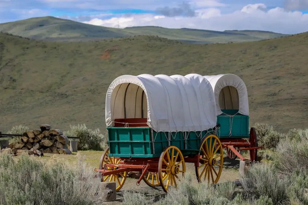 Oregon Trail covered wagons near Baker City, Oregon