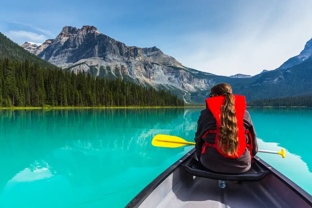 Canada Road Trips. Canoeing on Emerald Lake in summer at the Yoho National Park alberta Canada