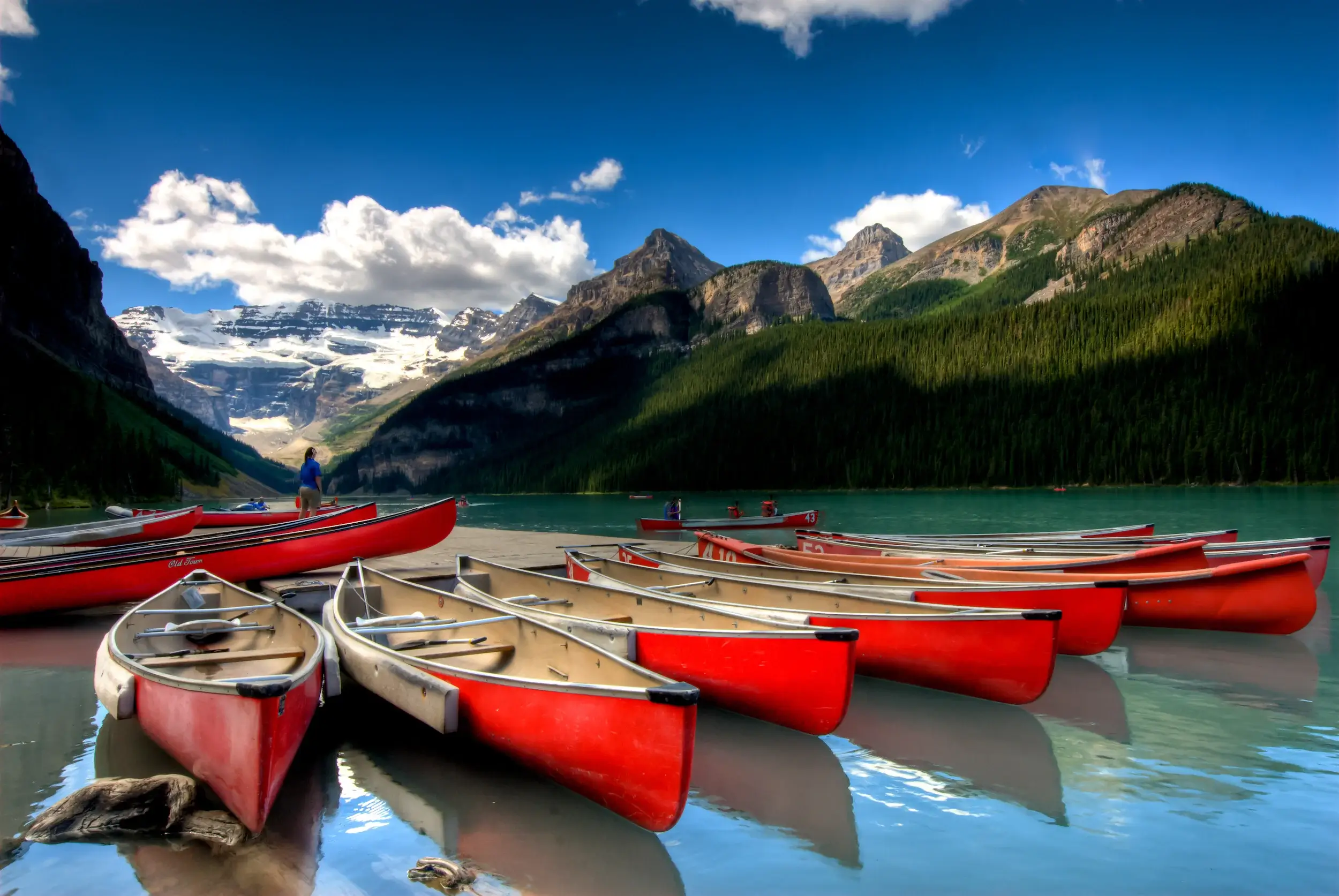 Banff National Park, Alberta, Canoes on the lake.